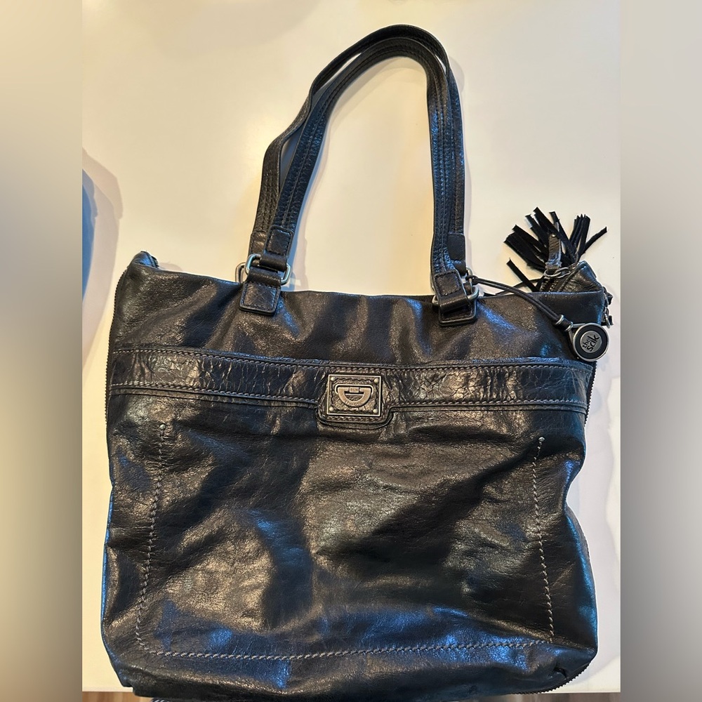 The Sak Black Leather Tote Bag with Tassel Accent